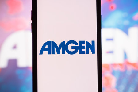 Smartphone with Amgen logo on the screen. High quality photo.のeditorial素材