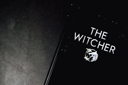 The Witcher from Netflix TV series Poster, the iPhone with shot of The Witcher.のeditorial素材