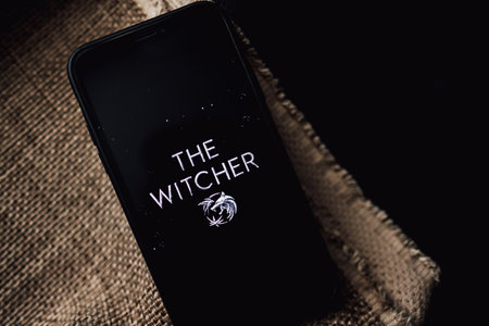 The Witcher from Netflix TV series Poster, the iPhone with shot of The Witcher.のeditorial素材