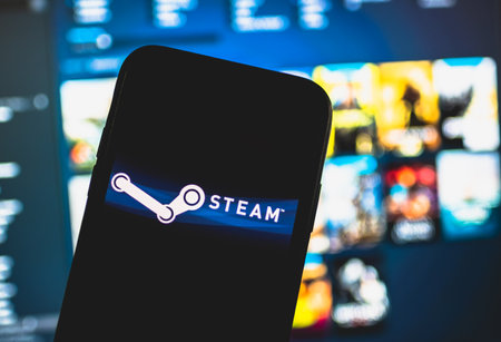 Steam app logo on the smartphone screen. Copy space.のeditorial素材