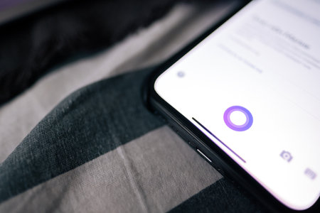 iPhone with voice assistant Alice from Yandex on the screen, voice assistant alice analogue Siri in Russia.のeditorial素材