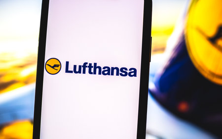Lufthansa airlines logo on the smartphone screen. High quality photo.