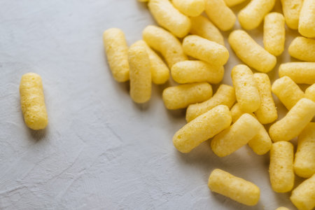 Background with milk corn sticks. Corn sticks with milk.