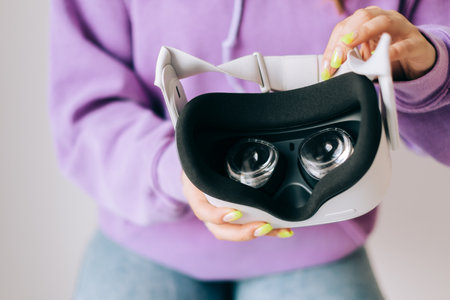 Oculus Quest 2 virtual reality headset in hands.