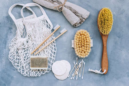 Natural eco friendly accessories for self care, dry massage brushes, bamboo toothbrushes, loofah facial sponges and natural soap.の写真素材