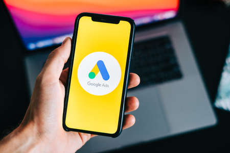Google Ads logo on smartphone screen.