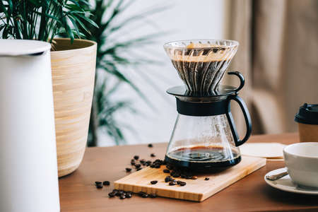 Alternative coffee brewing method, using pour over dripper and paper filter.