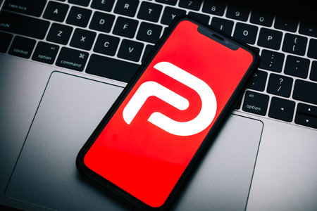 Parler logo on smartphone screen.のeditorial素材