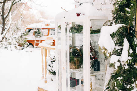 Backyard of country house with Christmas decoration after snowfall.の写真素材