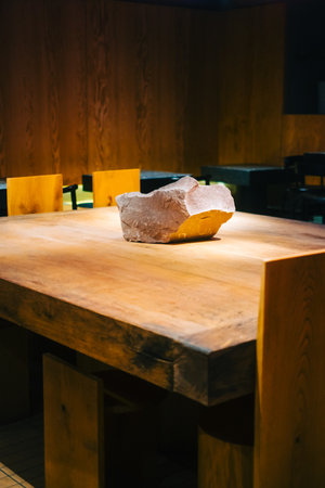 Interior detail of modern asian cafe with wooden table and chairs.の写真素材