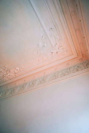 White ornamental ceiling in victorian style.の写真素材