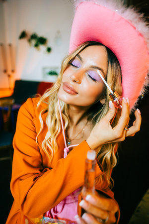 Young attractive caucasian woman holding beauty brush. make up, beauty treatmentの写真素材