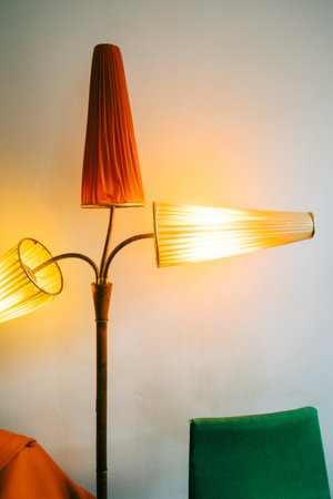 Vintage floor lamp near white wall.の写真素材