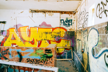 Background of an abandoned building with graffiti on the wallsのeditorial素材