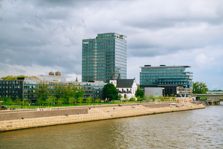 Cityscape of the waterfront of the city of Cologne with Hyatt regency hotel.のeditorial素材
