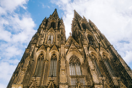 Cologne Cathedral with blue sky. Cologne Cathedral, or Kolner Dom, is the main landmark of Cologne and a catholic church in Germany.の写真素材