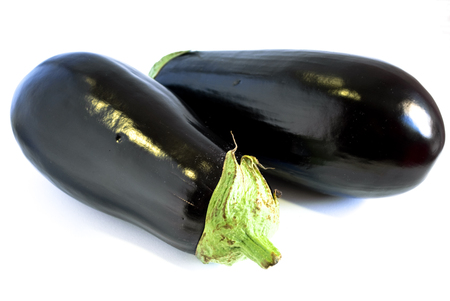 Two big purple aubergine isolated on white backgroundの写真素材