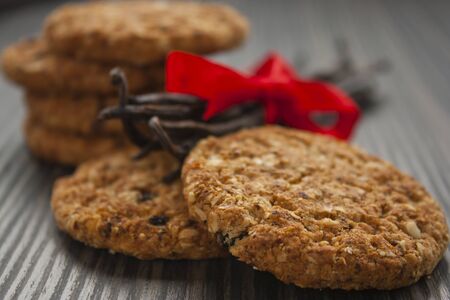 Pile of wholegrain cookies with raisins and nuts.の写真素材
