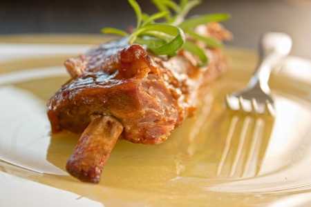 Veal ribs with gravy, rosemary and red winw.の写真素材