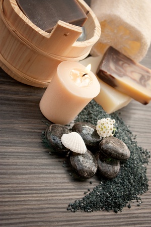 Spa setting on black  volcanic pebbles.の写真素材