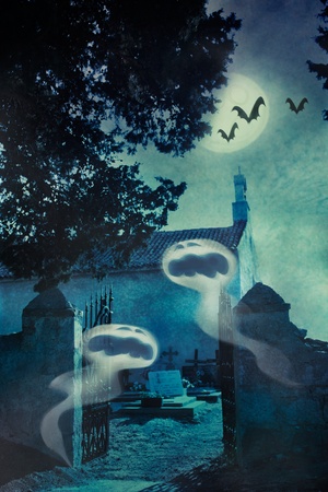 Halloween illustration with spooky ghosts  on the graveyard in front of the graveyard entrance gate and chapel, bats and full moon in the backgroundの写真素材