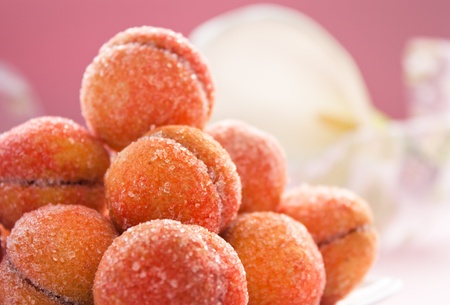 Arrangement of peaches shaped homemade cookies. Shallow depth of field.の写真素材