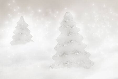 Two Christmas trees on bokeh backgroundの写真素材