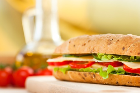 Cheese sandwich with paprika and green lettuceの写真素材