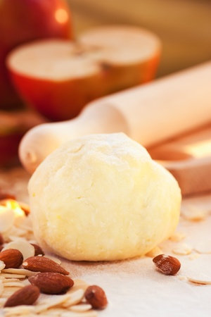 Apple pie ingredients. Dough, apple slices and almonds.の写真素材