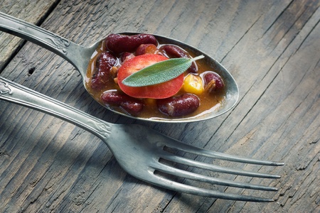 Chili con carne plate. Mexican traditional dish in rustic settingの写真素材