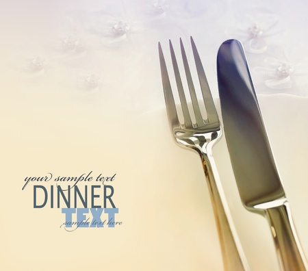 Fork and knife in elegant table settingの写真素材