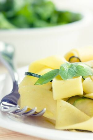 Tagliatelle pasta with zuccini, garlic and olive oil.の写真素材