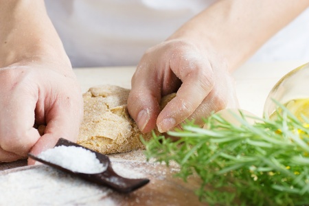 Woman is kneading dough balls.の写真素材