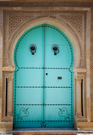 Blue wooden door in arabic style. Traditional arabic arhitectureの写真素材