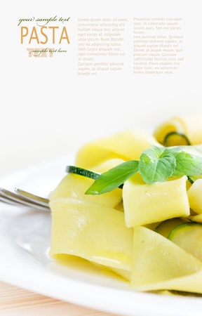 Tagliatelle pasta with zuccini, garlic and olive oil.の写真素材