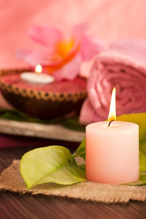 Spa setting  in pink tones with candlesの写真素材