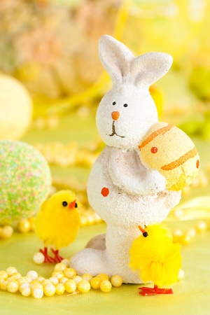 Easter setting with Easter eggs, chicks and rabbit.の写真素材