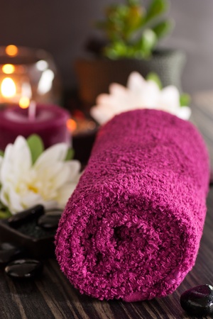 Spa setting  with massage stones and towel.の写真素材