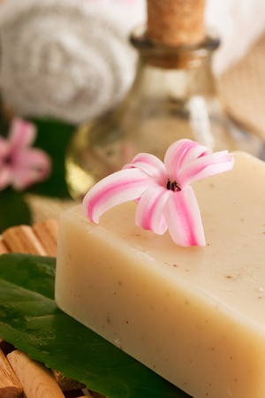 Spa setting with bath salt and floral waterの写真素材