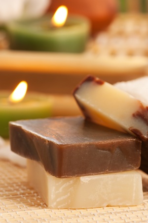 Spa setting with natural soaps candlesの写真素材