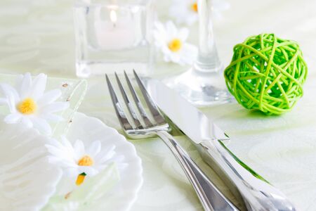 Spring table setting with flowers and decorationの写真素材