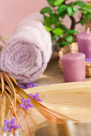 Natural spa setting with flowers  and towel.の写真素材