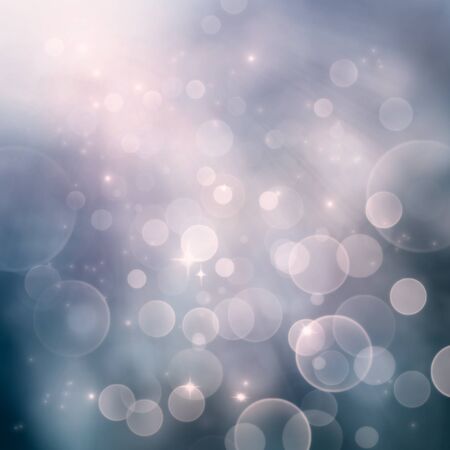Festive winter  abstract nature background with  bokeh lights and starsの写真素材