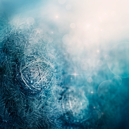 Festive winter  abstract nature background with  bokeh lights and Christmas treeの写真素材