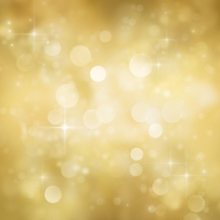 Festive gold Christmas abstract  background with bokeh lights and stars. の写真素材