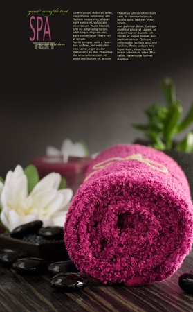 Spa setting  with massage stones and towel.の写真素材