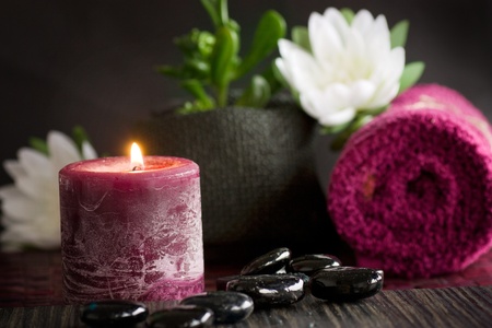 Spa setting  with massage stones and towel.の写真素材