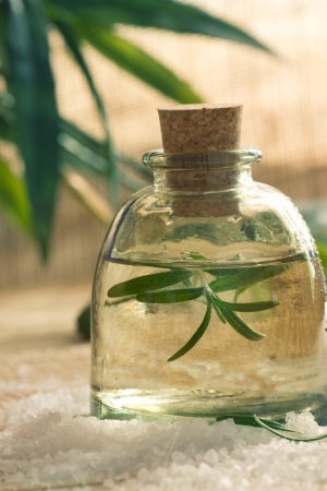 Spa wellness setting with rosemary  and  natural remedies.の写真素材