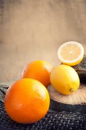 Fresh fruit with copyspace  Oranges and lemonsの写真素材