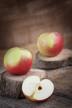 Fresh organic apple on wooden backgroundの写真素材